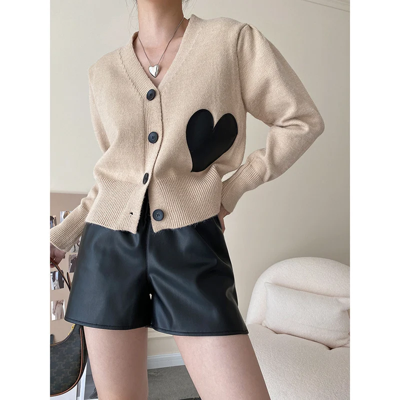 Big Love V-neck knitted cardigan with contrasting color leather label, offers warmth and effortless style for you. — photo 4