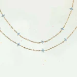 Tornozeleira azul com flores para praia e verão. Sinta a brisa do mar com este acessório charmoso, leve e perfeito para o calor. — foto 1