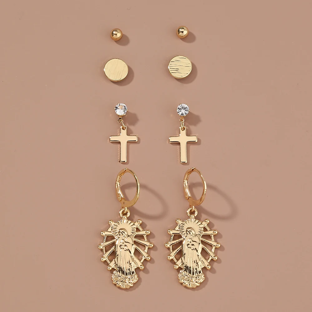 Brincos de conjunto de cruz religiosa, fé e estilo. Um toque de espiritualidade para seu dia a dia. Compre agora e expresse sua devoção. — foto 2