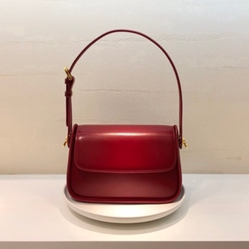 Bolsa feminina de couro com design elegante e temperamental, alça de ombro única e estilo underarm. Perfeita para um look fashion e sofisticado. — foto 7