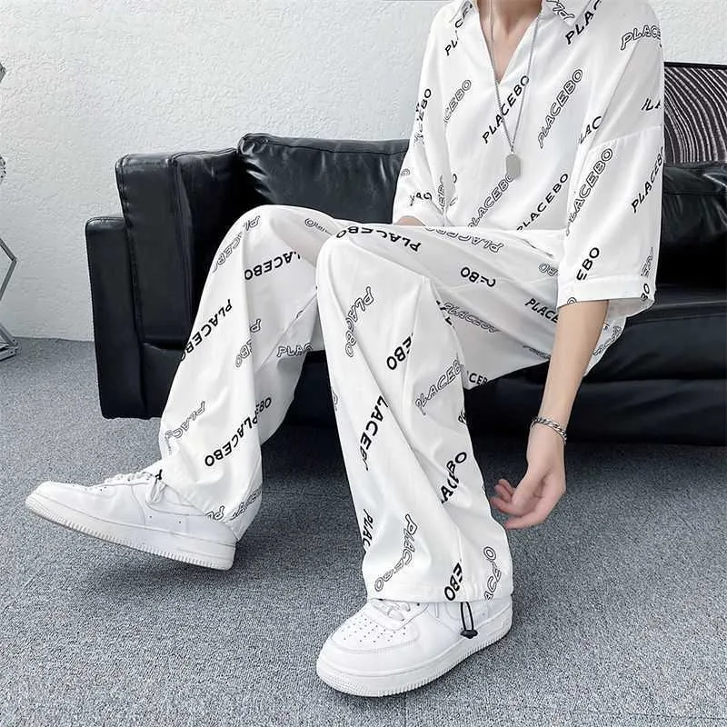 Terno Masculino Fino, Moderno, Decote em V, Camiseta Manga Curta. Ideal para o verão, fresco e estiloso. Conforto e elegância em um só traje. — foto 2