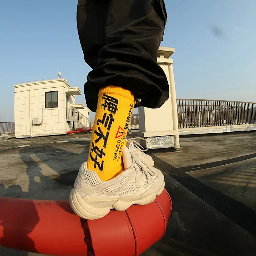 Title 6, Text in tube socks for ultimate comfort and ind...