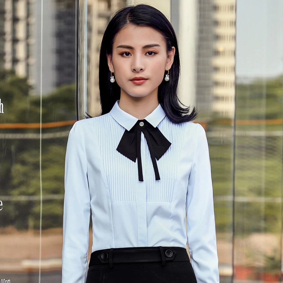 Camisa feminina de manga longa para trabalho profissional Conforto e elegância para o ambiente corporativo Tecido de alta qualidade e caimento impecável Ideal para o dia a dia. — foto 1