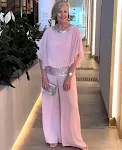 Camisa com lantejoulas e gola redonda combinando com cores batwing, calças largas, terno feminino — foto 26