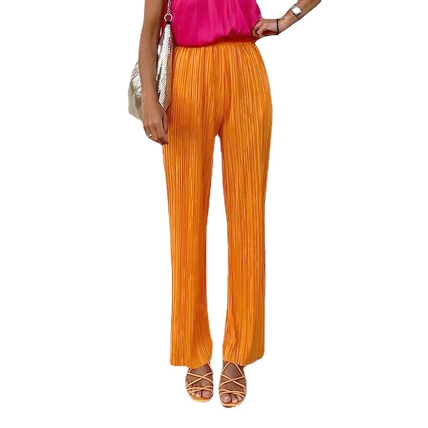 Pantaloni ampi arancione giallo, vita alta, gamba larga, drappeggio morbido e spacco. Perfetti per un look comodo ed elegante. — foto 4