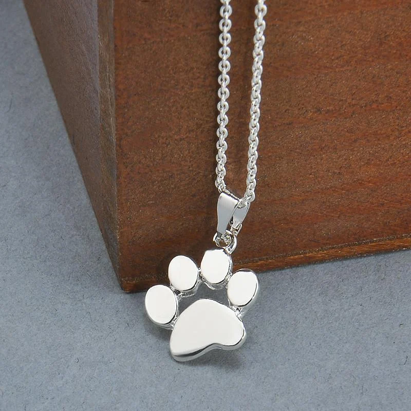 Colar de patinha para amantes de pets, design elegante e único, aço inoxidável durável, presente ideal para donos de cães e gatos. — foto 1
