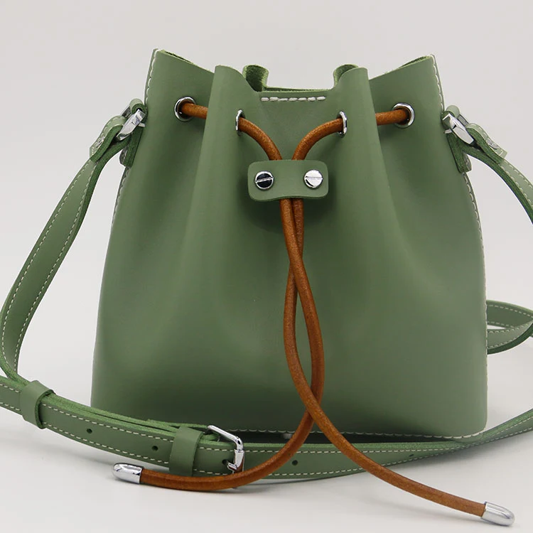 Hand-stitched Leather Bucket Bag. Experience timeless style and everyday practicality. Spacious and durable for all your — photo 1