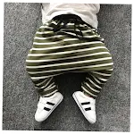 Calças harem listradas femininas, soltas e confortáveis, perfeitas para yoga, praia ou uso casual. Conforto e estilo em cada movimento. — foto 1