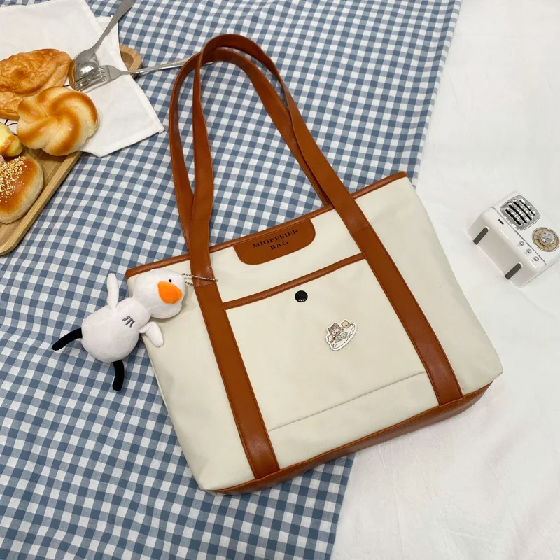 Bolsa Tote Literária Retrô de Ombro em Lona Grande Capacidade – Leve seus livros, notebook e muito mais com estilo e conforto — foto 4