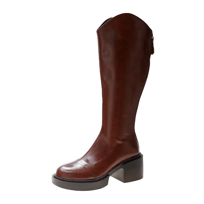 Title 3, Womens elastic tube boots, featuring a thick s...