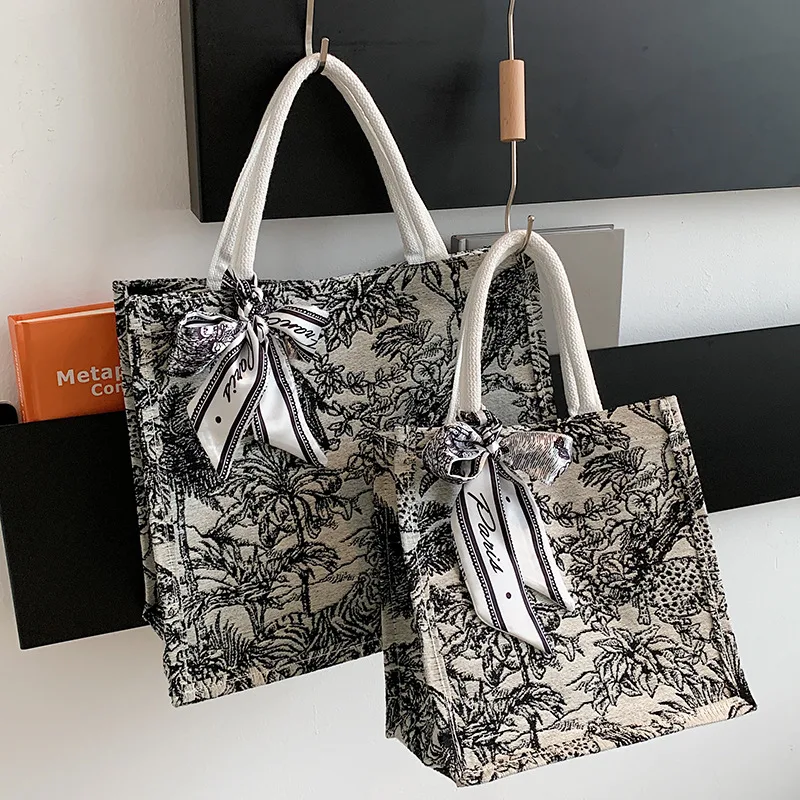 Bolsa de mão feminina de lona para trabalho e dia a dia. Confortável, espaçosa e estilosa para carregar tudo o que você precisa com elegância. — foto 24