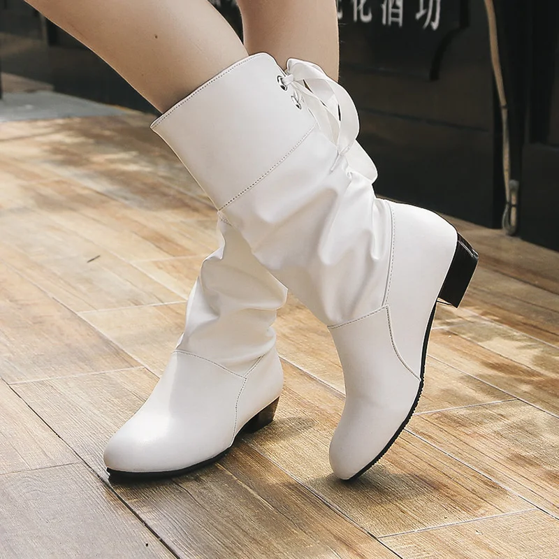 Botas de salto baixo novas outono e inverno, perfeitas para mulheres que buscam conforto e estilo. Mantenha seus pés aquecidos e na moda! — foto 4