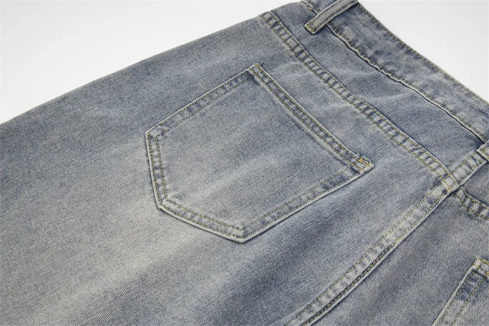 Splash Ink Loose Denim Trousers for Men and Women. Comfortable and casual style. Modern design with ink splashes. Perfec — photo 1