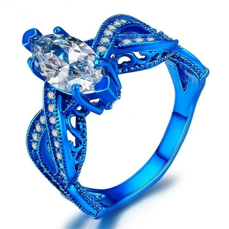 Anel de par azul e dourado da moda, para celebrar o amor e a união. Design elegante e sofisticado, ideal para casais. Um presente especial e memorável. — foto 2