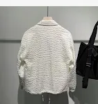 Casaco novo de manga longa solto com gola polo. Conforto e estilo em uma peça só. Ideal para um visual casual e moderno, perfeito para o dia a dia. — foto 11