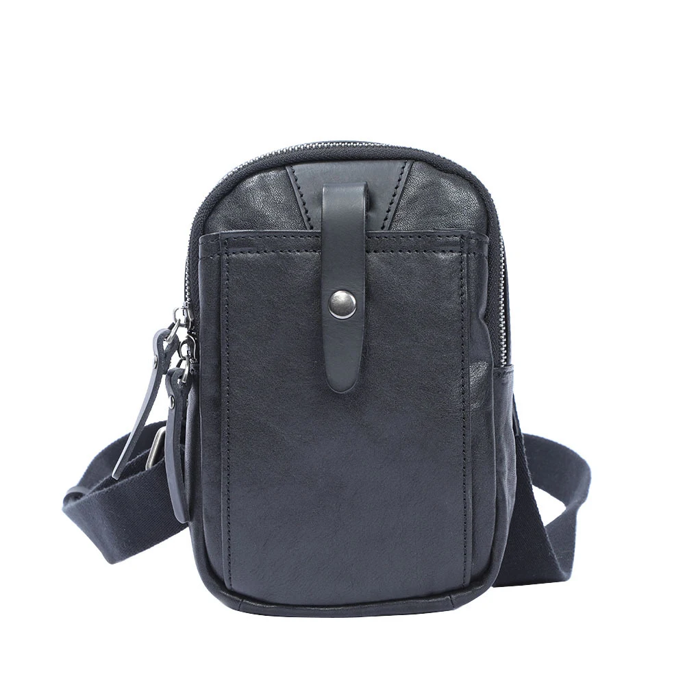 Bolsa transversal de couro com uma alça para homens e mulheres. Moderna e funcional, ideal para uso diário e viagens. — foto 1