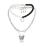 Colar feminino com corrente cruzada punk com contraste de cores, acessório moderno e ousado, perfeito para looks estilosos e expressivos. — foto 3