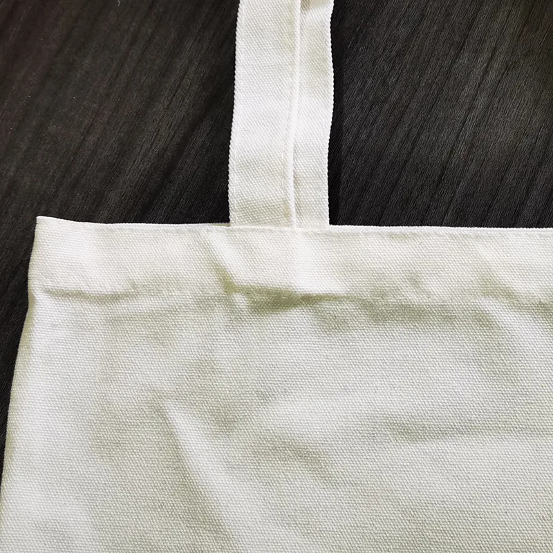Bolsa tote de lona floral para mulheres e meninas. Leve seus pertences com estilo e praticidade. Perfeita para compras, escola e uso diário. — foto 13