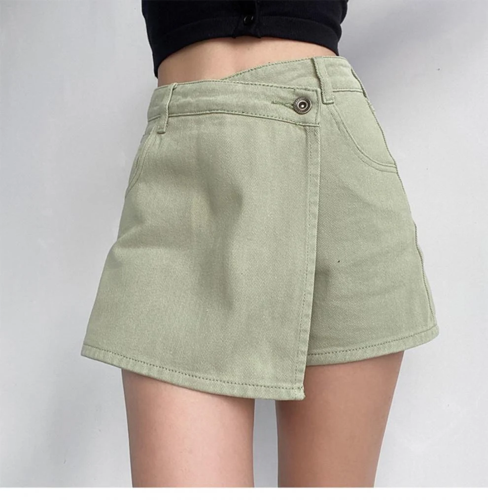 Saia jeans irregular anti-exposição feminina, design moderno e proteção elegante. Perfeita para um visual único com conforto e estilo. — foto 3