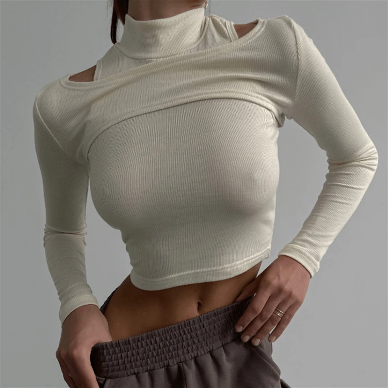 Top da donna tinta unita a maniche lunghe e vestibilità slim. Un capo versatile e confortevole per un look elegante e adatto a ogni occasione. — foto 16