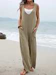Women's fashion jumpsuit with pure color stickers, V-neck, bib, and wide leg trousers. Comfortable and stylish all in on — photo 3