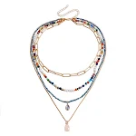 Bohemian meerlaagse ketting met rijstvormige kralen en contrasterende kleuren, perfect voor een casual of chique uitstraling. — foto 15