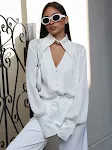 Camisa suelta de moda para mujer con solapa y mangas largas, ideal para un look casual y cómodo. Perfecta para cualquier ocasión. — foto 1