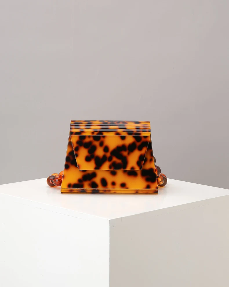 Title 14, Acrylic dinner bag, a stylish and modern access...