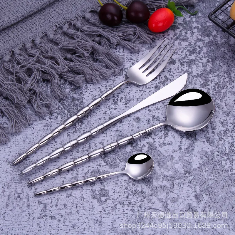 Title 14, Stainless steel western tableware cutlery set. ...