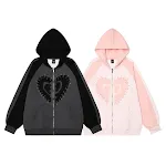 Jaqueta com capuz patchwork com contraste de cores e mangas raglan para homens e mulheres. Conforto e estilo em uma peça única e moderna. — foto 3