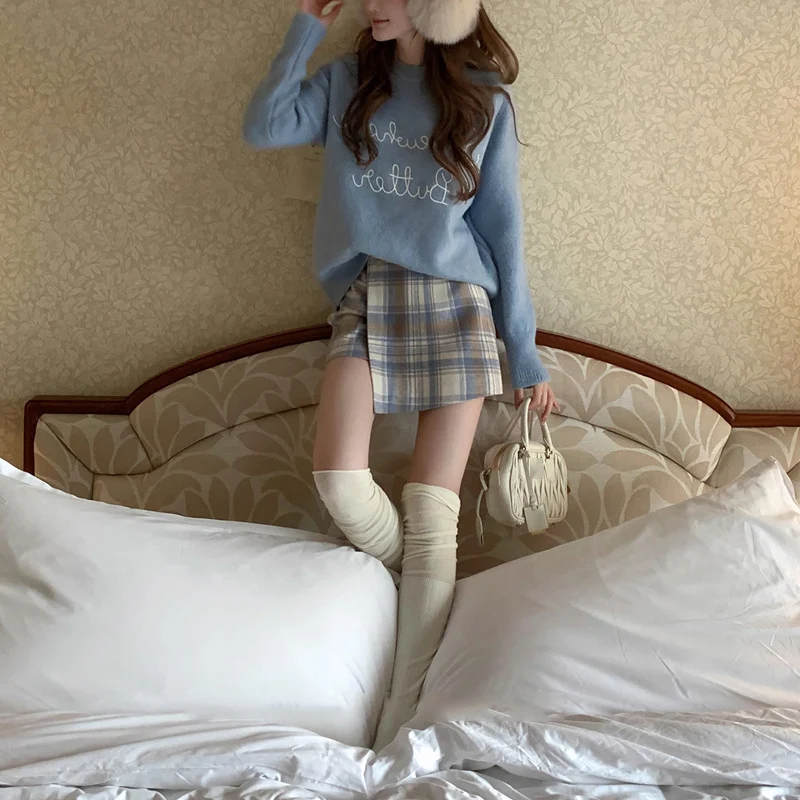 Saia xadrez vermelha feminina outono e inverno estilo americano retrô Saia em A e culotes de lã. Conforto e estilo. — foto 10