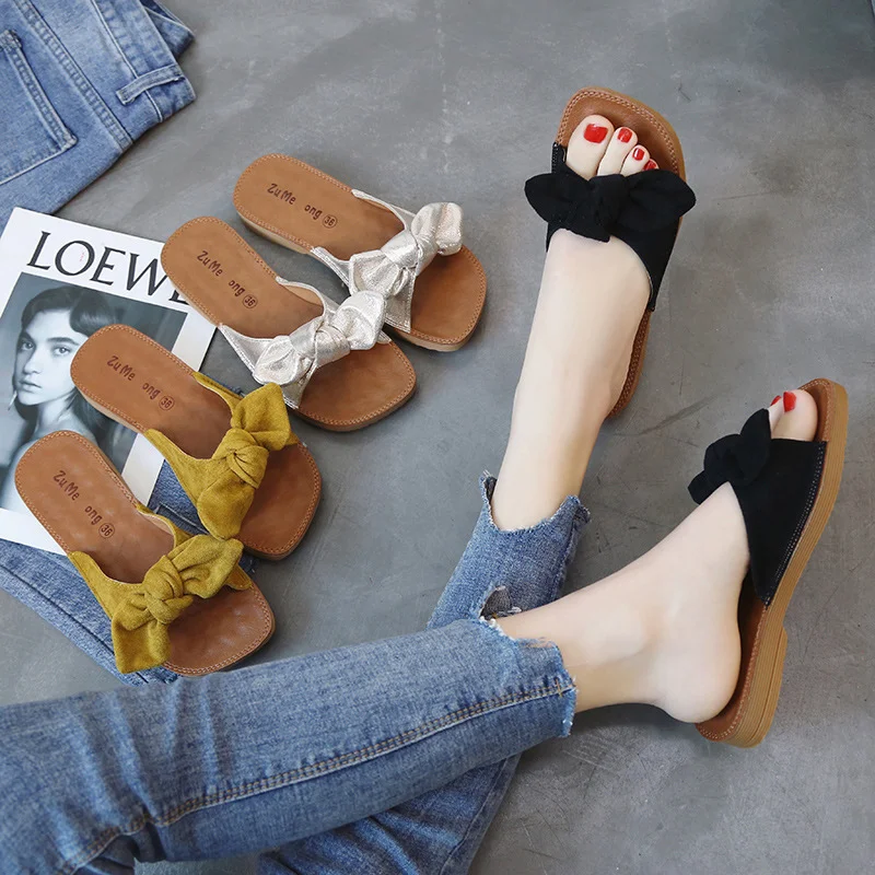Zoete zomer casual strik studentenschoenen slippers platte zool comfort. Perfecte schoenen voor de zomer, ideaal voor studenten. — foto 1