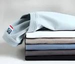Nova camiseta de manga longa de algodão com gola redonda e estampa, oferece conforto e estilo casual, perfeita para uso diário e relaxado. — foto 13