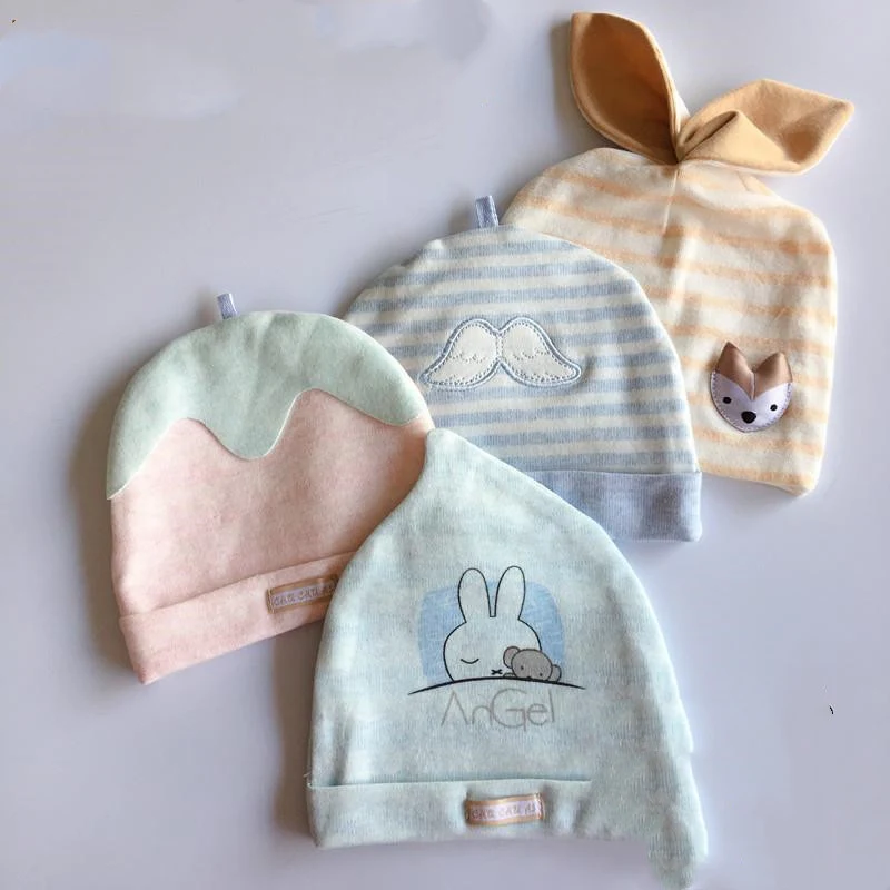 Cappellino in cotone per neonati a forma di pneumatico, morbido e traspirante. Protegge dal sole e mantiene la testa fresca. Perfetto per i più piccoli. — foto 1