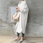 Blusa longa solta de moda feminina, perfeita para um visual casual e confortável. Ideal para o dia a dia, com estilo e liberdade de movimento. — foto 3