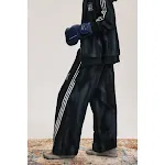 Pantaloni della tuta americani retrò strappati, ampi e dritti. Comfort e stile casual per un look rilassato e di tendenza. — foto 6