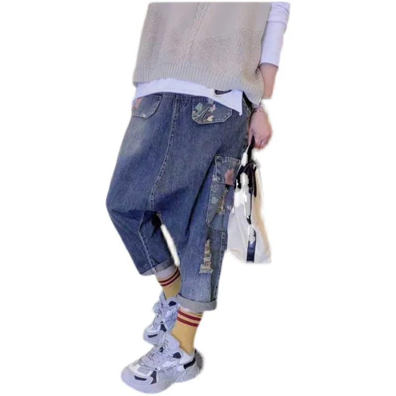 Pantalones holgados de cintura alta con múltiples bolsillos y roturas para tallas grandes, cómodos y con tiro amplio. — foto 2