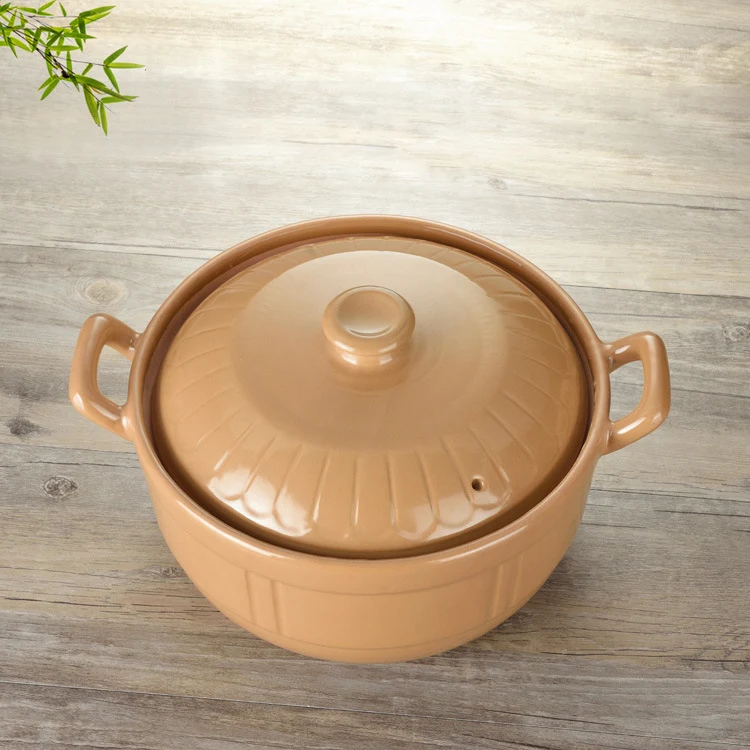 Title 2, Rich white ceramic casserole with orange flower...