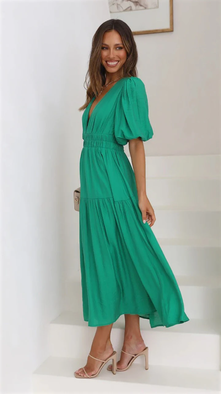 Title 18, V-neck waist-tight mid-length dress. This dress...