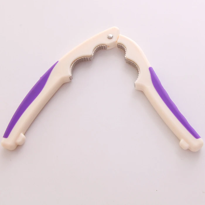 Simple Zinc Alloy Walnut Clip Opener, designed for easy and efficient opening and closing of clips, offering durability — photo 4