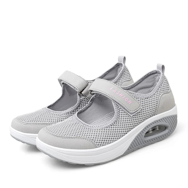 Tênis de corrida feminino com malha para atividades ao ar livre. Leve e respirável, ideal para corridas, treinos e caminhadas com conforto e estilo. — foto 1