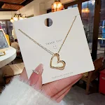 Luminária pendente simples com design de amor vazado, luxo minoritário, corrente de clavícula feminina, realce seu temperamento e estilo. — foto 5