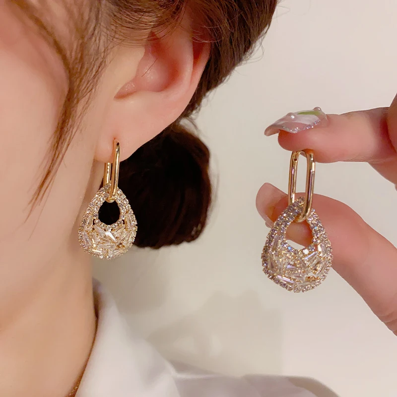 Brincos femininos estilo socialite com gotas d'água de zircônio, fecho de fivela dupla, realçando a elegância e sofisticação em cada detalhe. — foto 6