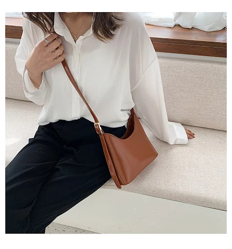 Title 6, Lässige Retro Bucket Bag mit breitem Schulterri...