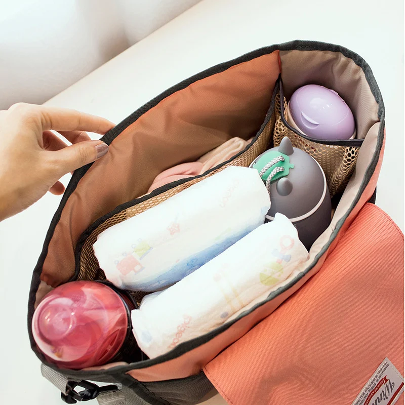 Bolsa Mamãe Store, completa e organizada. Ideal para passeios com bebê, com espaço para fraldas, mamadeiras e acessórios. — foto 1