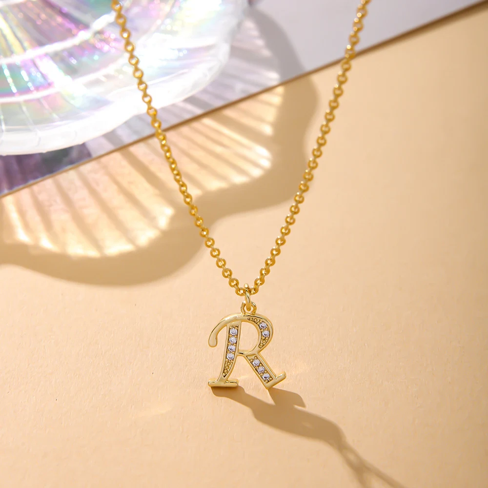 Colar de cobre com 26 letras do alfabeto inglês incrustadas com zircônia, um acessório de moda elegante e personalizado. — foto 8