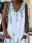 Vestido casual solto com estampa de folhas e bolsos. Perfeito para o dia a dia, oferece conforto e estilo. Leve e descontraído, ideal para você. — foto 6