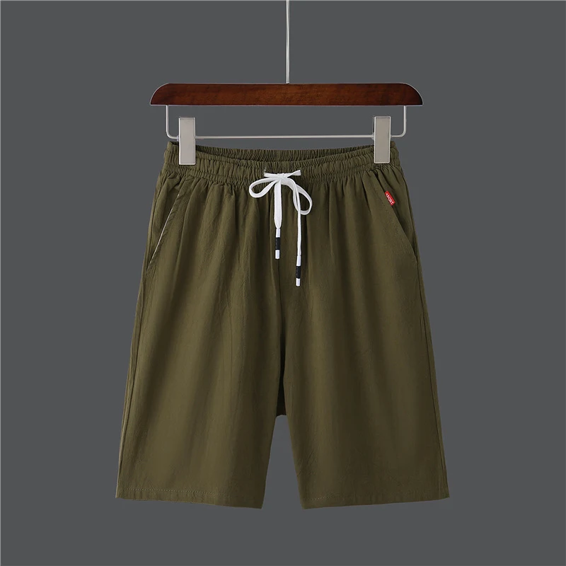 Calças casuais masculinas plus size para praia, leves e confortáveis. Perfeitas para o verão, desfrute do sol com estilo e liberdade de movimento. — foto 9