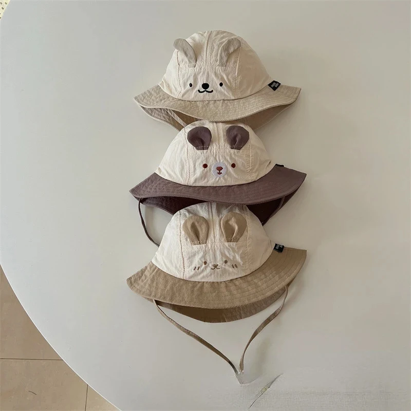 Chapéu de bebê verão novo estilo, fofo e de secagem rápida. Perfeito para proteger seu bebê do sol e mantê-lo fresco e com estilo neste verão. — foto 11