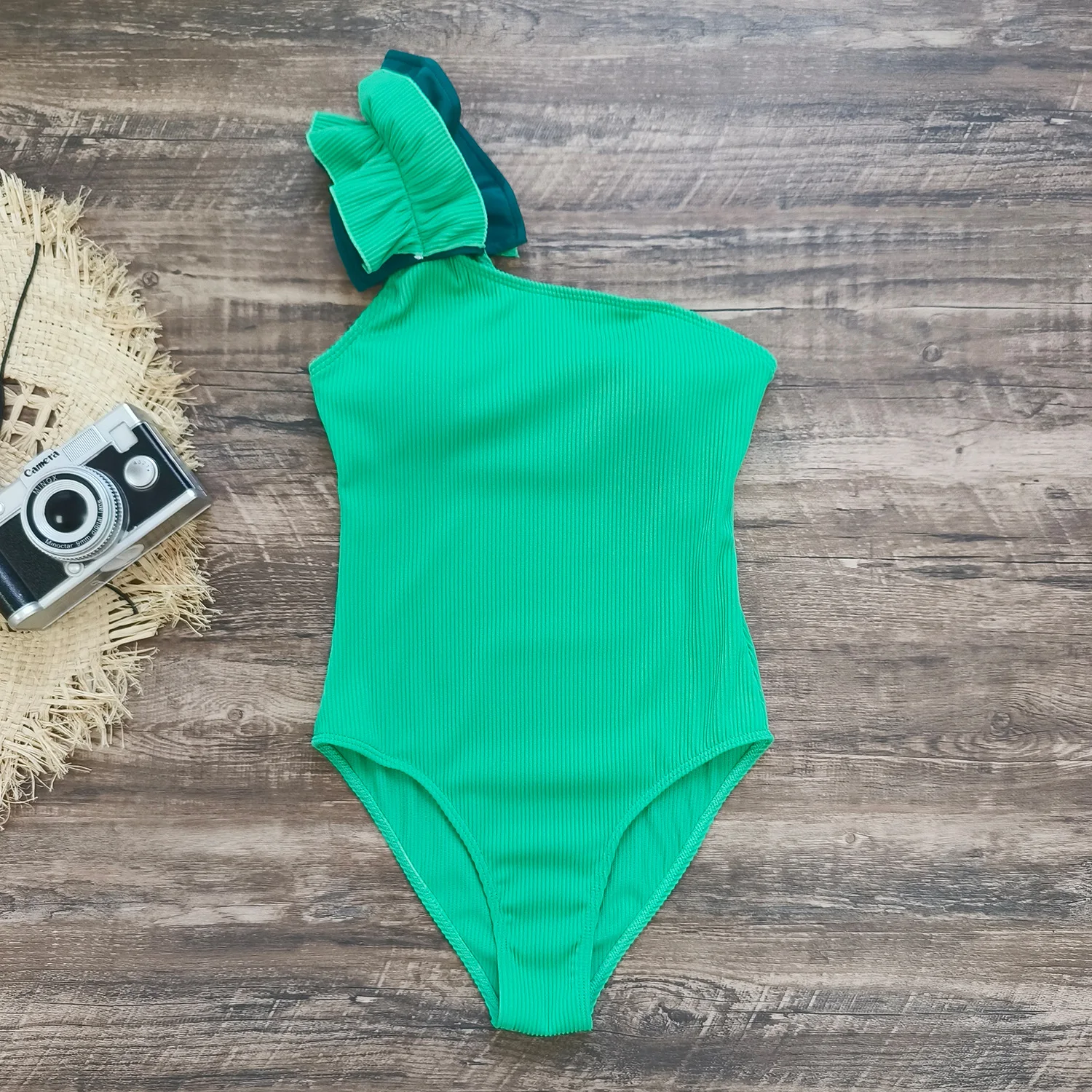Title 30, Womens two-piece swimsuit featuring a single-s...